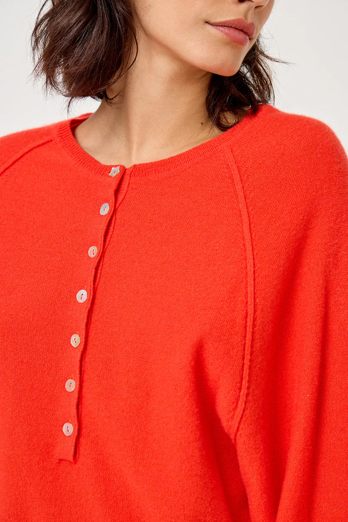 FIVE ORANGE STAR BUTTON KNIT